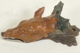 A cold painted bronze letter clip cast as a fox head, 6" long