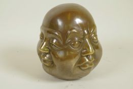 A bronze four faced Buddha head, 5" high