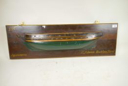 A mounted half hull model of the warship Agamemnon, bears the name H. Adams Bucklers Hard, 35½" x
