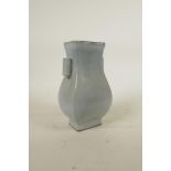 A Chinese porcelain vase with a celadon Ru style glaze and two lug handles, 7" high