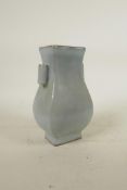 A Chinese porcelain vase with a celadon Ru style glaze and two lug handles, 7" high