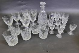 An Edinburgh Crystal cut glass stem vase, and a good cut crystal glass decanter with a part suite of