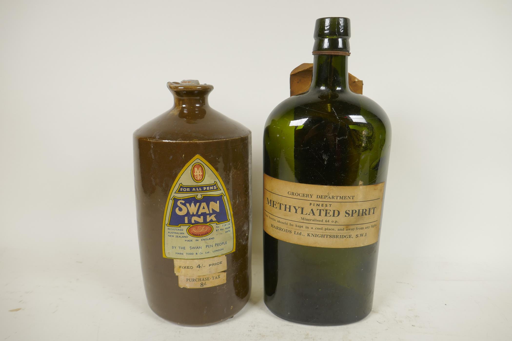 A large stoneware Swan ink bottle with original label together with a Harrods Grocery Department