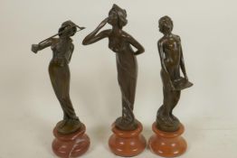 Three Art Nouveau style figures of ladies, 9" high