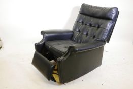 A Parker Knoll, model no P.K.N30 Lazyboy style leatherette reclining armchair, foot rest mechanism