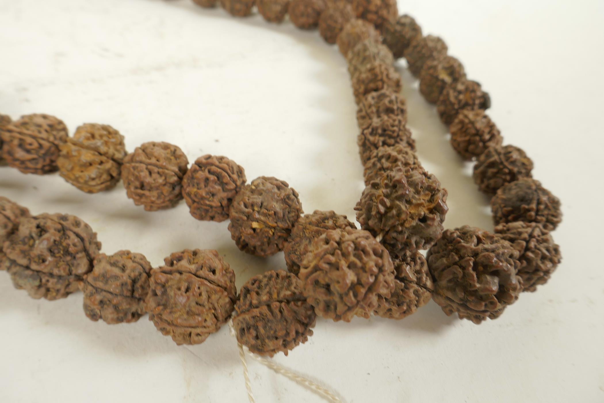 A string of nut kernel beads, 66" long - Image 2 of 3
