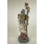 A Lladro figurine of a Chinese farmer (Shao Lao), by Jose Roig, manufactured between 1977 and