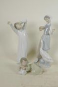 Three Lladro porcelain figurines, girl feeding geese, waking child and a sleeping angel, tallest 9½"