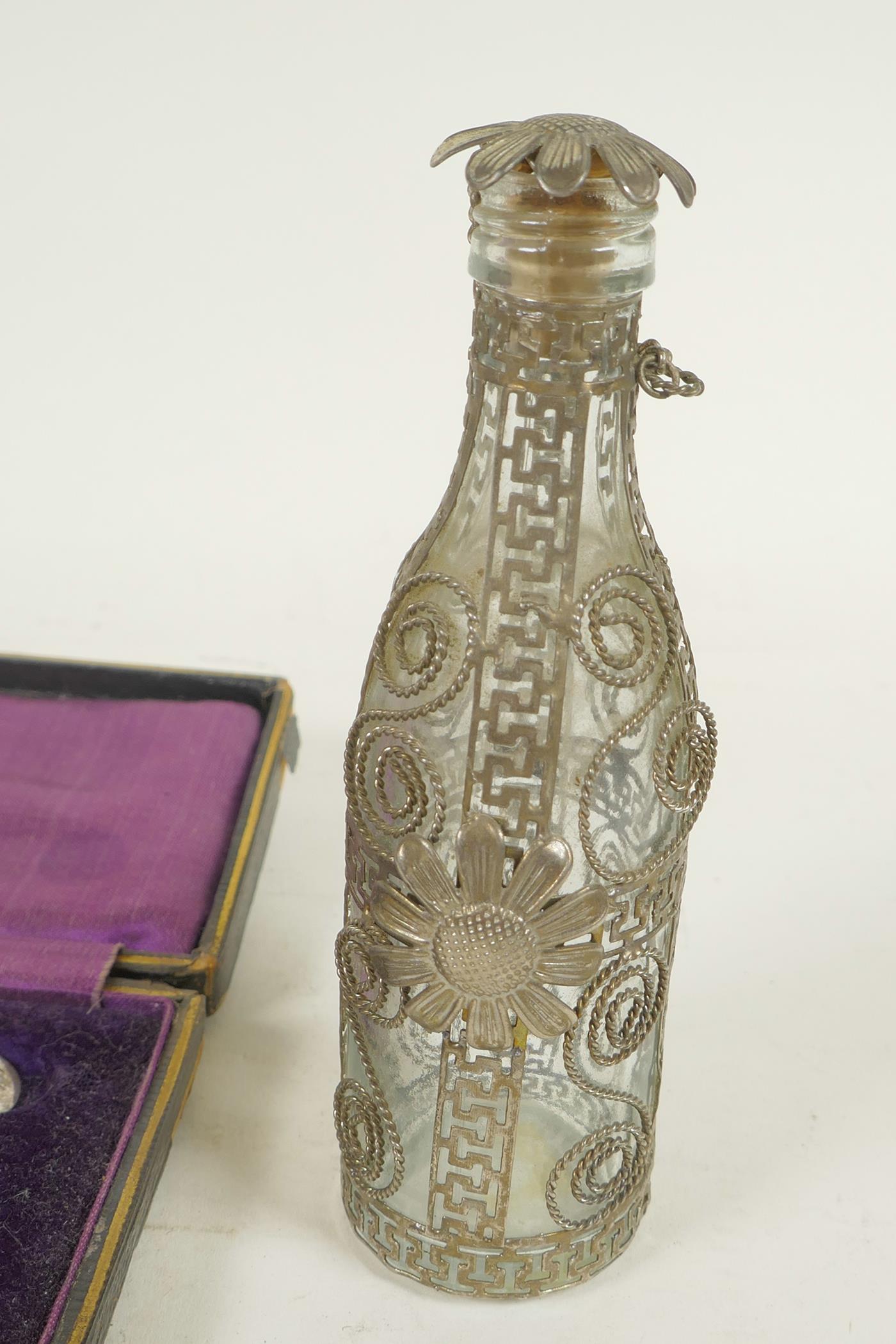 A glass perfume bottle in a white metal wire work case, 5" high, together with a cased pair of Irish - Image 3 of 3