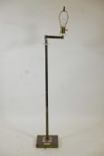 A brass and lucite standard lamp with cantilever arm