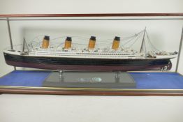 A cased model of RMS Titanic, 28" long, case 35½" x 9" x 13"