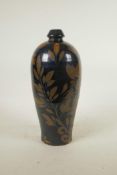 A Chinese Cizhou kiln vase with leaf decoration, 11½" high