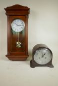 A mid C20th Smith's Enfield chiming mantel clock, dark wood effect bakelite casing and silver