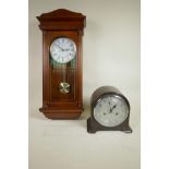 A mid C20th Smith's Enfield chiming mantel clock, dark wood effect bakelite casing and silver