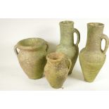 Four terracotta garden ornaments, a pair of Grecian style jugs, 15" high, a two handled vase and a