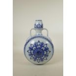A Chinese blue and white porcelain two handled moon flask with stylised decoration, 6 character mark