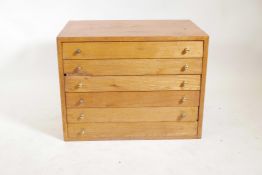 An oak printer's chest, with six fitted drawers, 28" x 18" x 22"