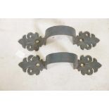 A pair of decorative painted steel downpipe brackets, 15" x 15" deep
