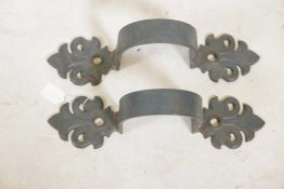 A pair of decorative painted steel downpipe brackets, 15" x 15" deep