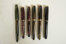 A collection of six Parker 'Vacumatic' fountain pens, US and Canadian made, with 14 gold nibs,