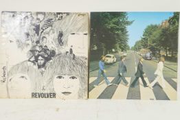 Two Beatles vinyl albums, 'Abbey Road' and 'Revolver', first pressings both used, covers split