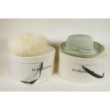 A ladies' Jacques Vert hat and a Russian white fox fur hat, both in Harrods hat boxes
