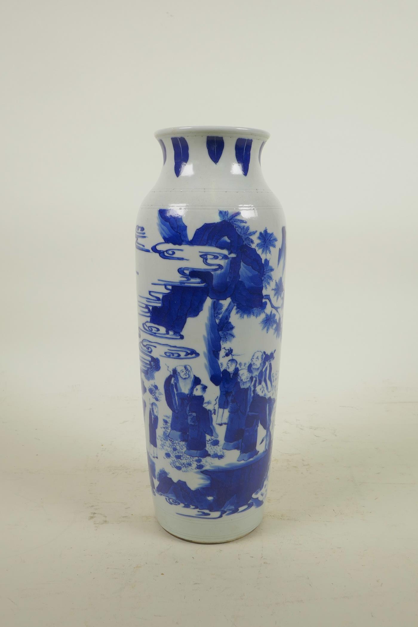 An early C20th Chinese blue and white porcelain vase decorated with figures in a mountain landscape,