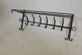 A vintage painted wrought iron hanging rack, 28" x 11" x 13"