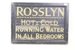 A vintage wood sign