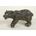 A bronze figure of a brown bear, 7" long