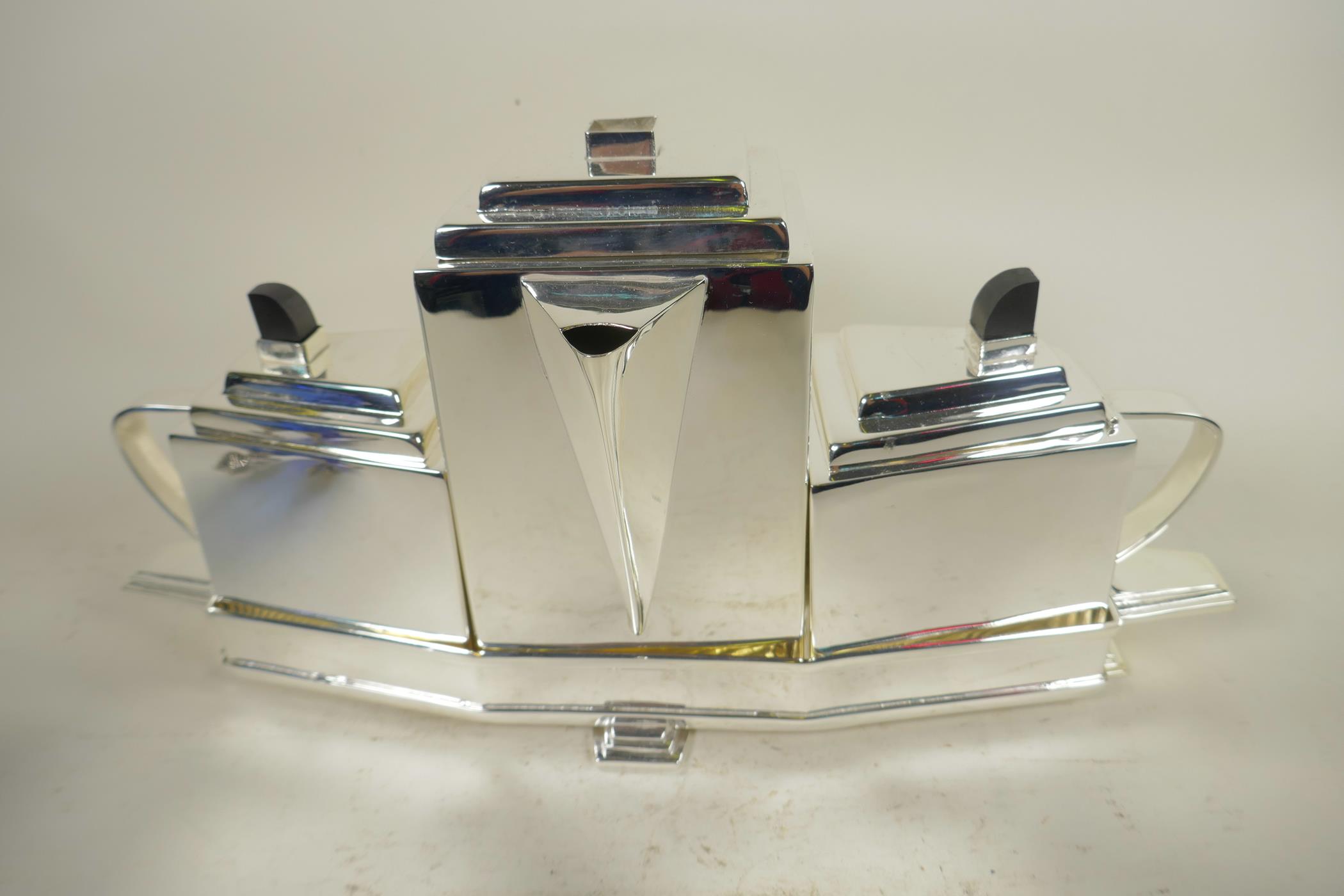 An Art Deco style four piece silver plated teaset and tray, 15" long