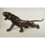 A Japanese bronze figure of a tiger, 25" long