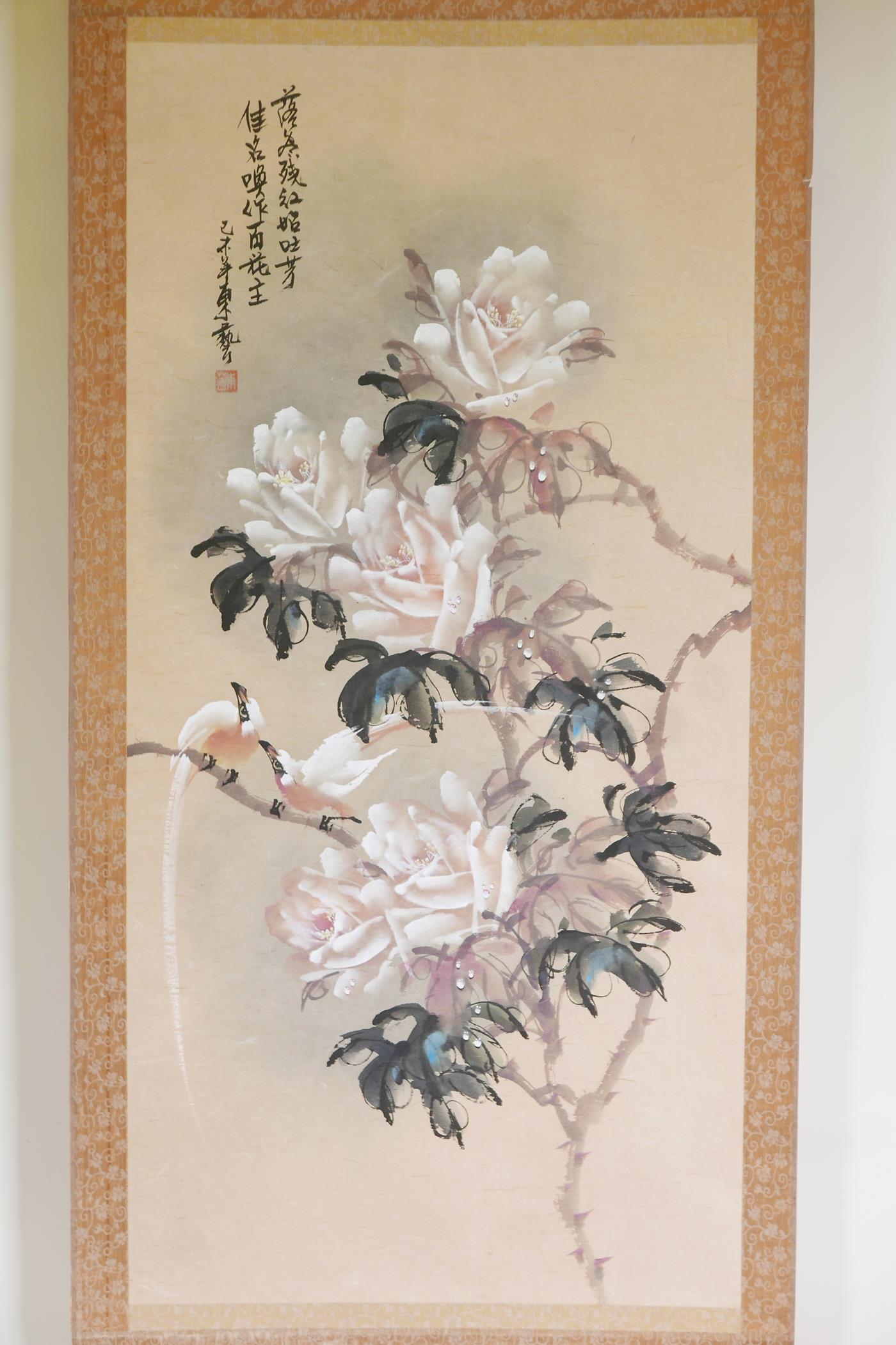 A Chinese painted scroll depicting white roses signed with calligraphy and red seal mark, 41" x 20"