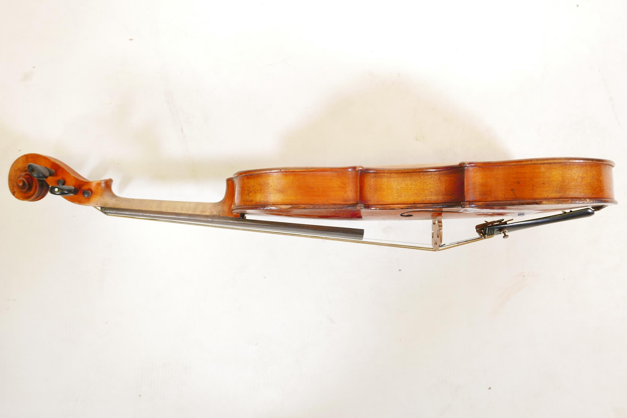 A late C19th/early C20th violin in ebonised wood case, no label, one piece back, split to front, and - Image 4 of 9