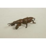 A Japanese Jizai style bronze of an insect, impressed mark to base, 2½" long
