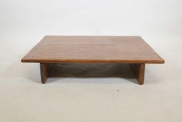 A Philippine hardwood low table, 35" x 27", 7" high