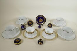 A pair of Limoges porcelain Philippe Deshoulieres Orleans Pattern teacups and saucers, with