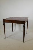 An American federal style inlaid mahogany centre table, with leather inset top and cupped corners,