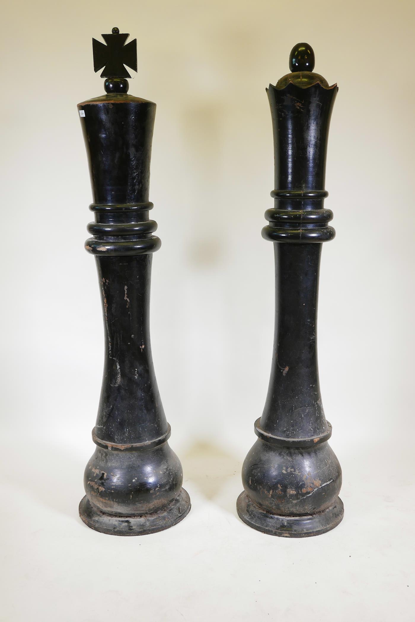 A pair of giant 'King and Queen' chess pieces, 72" high
