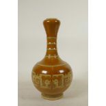 A Chinese garlic head shaped porcelain vase with imitation brown bamboo style glaze and archaic