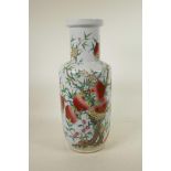 A Chinese polychrome porcelain Rouleau vase with enamelled peach tree decoration, 18" high