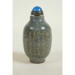 A Chinese hardstone snuff bottle with engraved and gilt character inscription, mark to base, 3" high