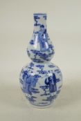 A Chinese blue and white porcelain double gourd vase decorated with the Eight Immortals, 4 character