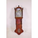 A German oak cased wall clock with painted arched dial decorated with a fisherman, windmill and