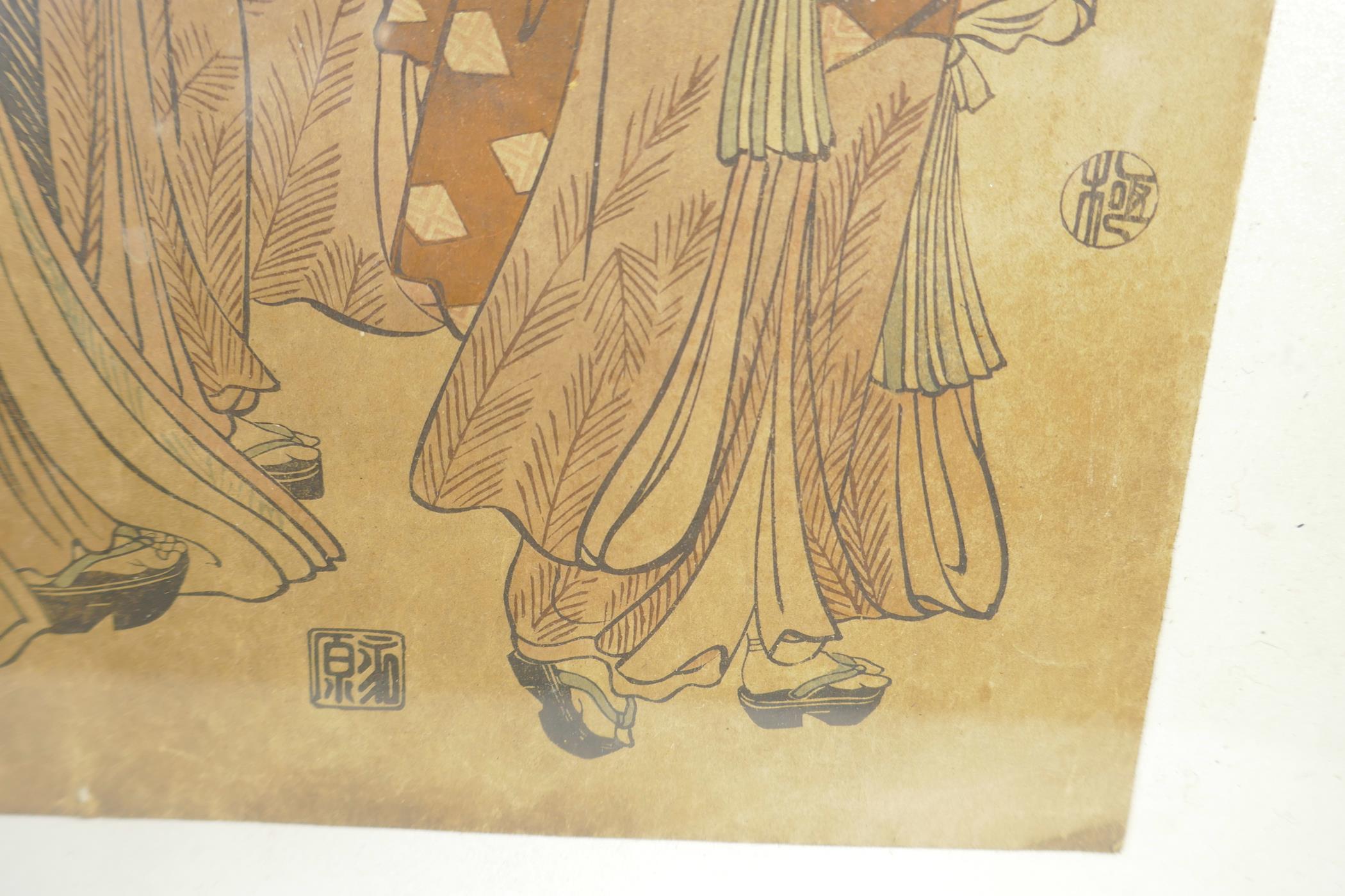 A Japanese woodcut colour print, two ladies and two children in a garden scene, described and signed - Image 4 of 4