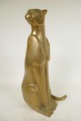 An Art Deco stylised bronze figure of a seated jaguar, 15¾" high