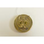 A brass vesta case with Louis Wain style cat decoration, 1½" diameter