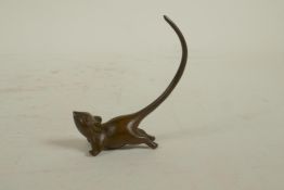 A Japanese Jizai style bronze of a mouse, indistinct mark to belly, 2½" long, 3" high