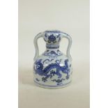 A Chinese blue and white porcelain flask with two handles, decorated with a dragon and phoenix, 4