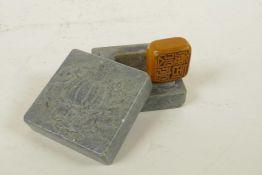 A Chinese amber soapstone seal in a hardstone box with carved gourd decoration, 2½" x 2½"